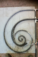 Volute en fer forgé, cintrage de profil en acier, console en fer forgée, reprise jusqu'a une parfaite harmonie